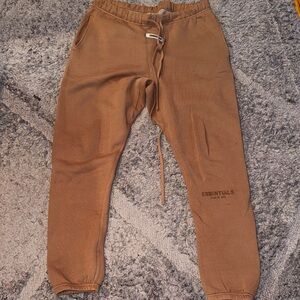 Fear of God Essentials brown joggers